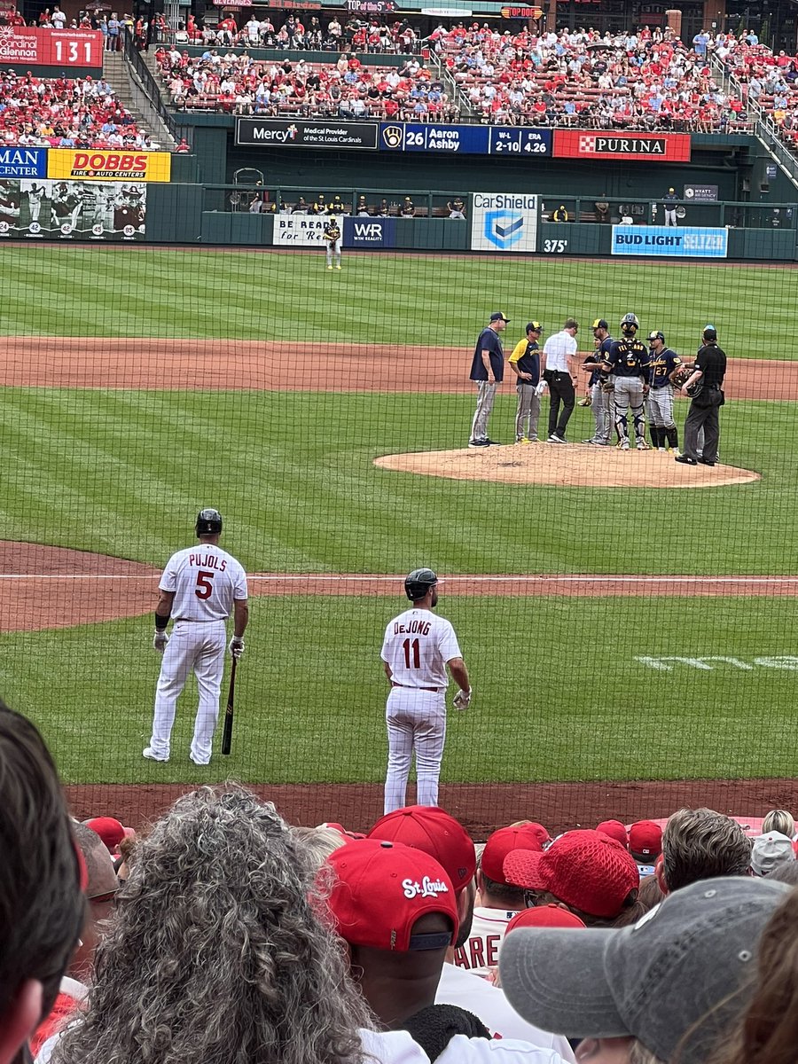 dornfeld's tweet photo. The Brewers had a meeting when Pujols came back to bat after last home run 😂 @Cardinals https://t.co/5KrEaMmYU2