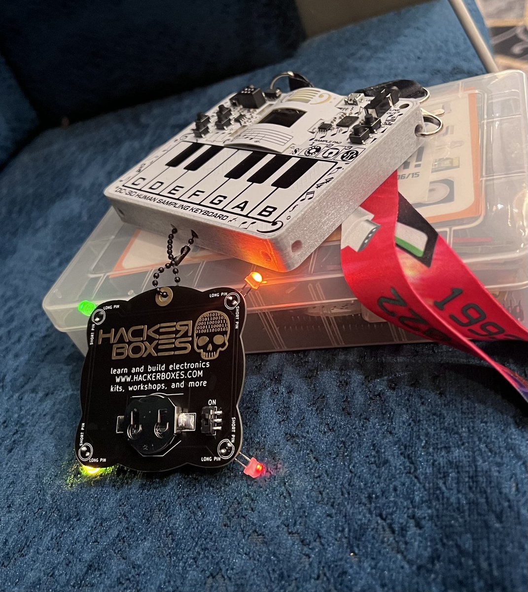 zmattor's tweet photo. @SyncreticIdiot is designing cases for the #DEFCON30 badge. Has a few cool features. It lays nice and flat so it’s easier to play, it prevents the badge strap from shorting out the board, and there are attachment points for dongles. Hit him up for the model! #badgelife #DC30 https://t.co/OWOT5Fxz0m