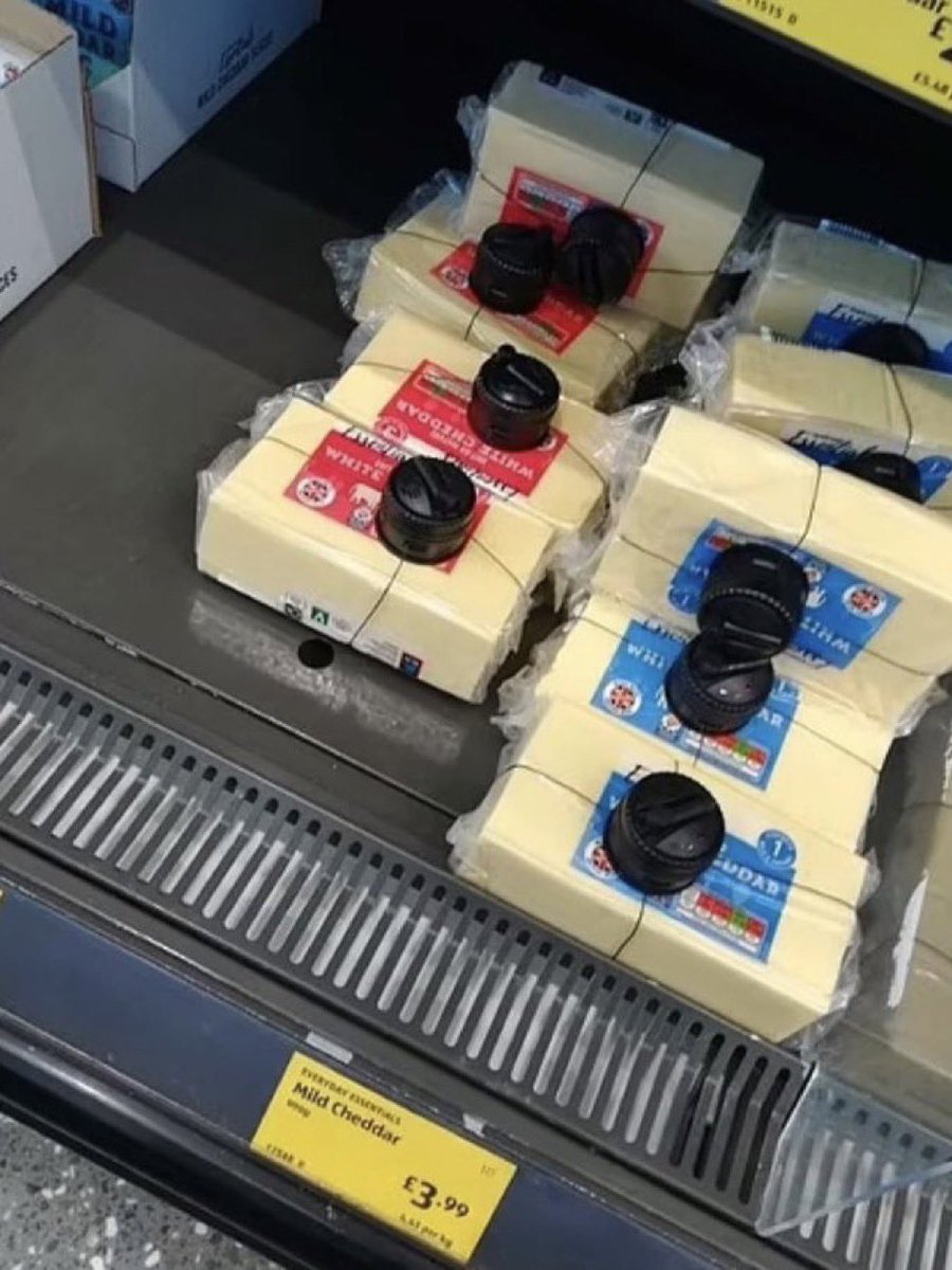 ayeejuju's tweet photo. why is Walmart treating the cheese like it’s the electronic section 😭 https://t.co/B4etOACjSz