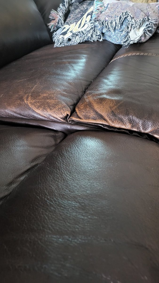 trish_jeffries's tweet photo. So frustrated with American Furniture Warehouse!  We spent nearly $5000 with them when we moved into our home.  Less than a year later, our over $2000 leather couch looks like this and they say this is normal and won't cover it under warranty.  Really disappointed. https://t.co/oTxbUqYiVg