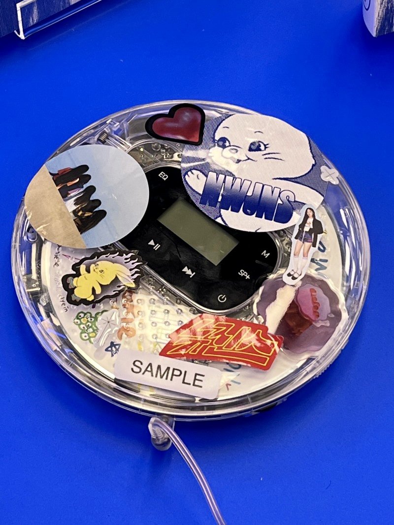 newjimuse's tweet photo. newjeans cd player from the pop up store https://t.co/ouLkzcm03O