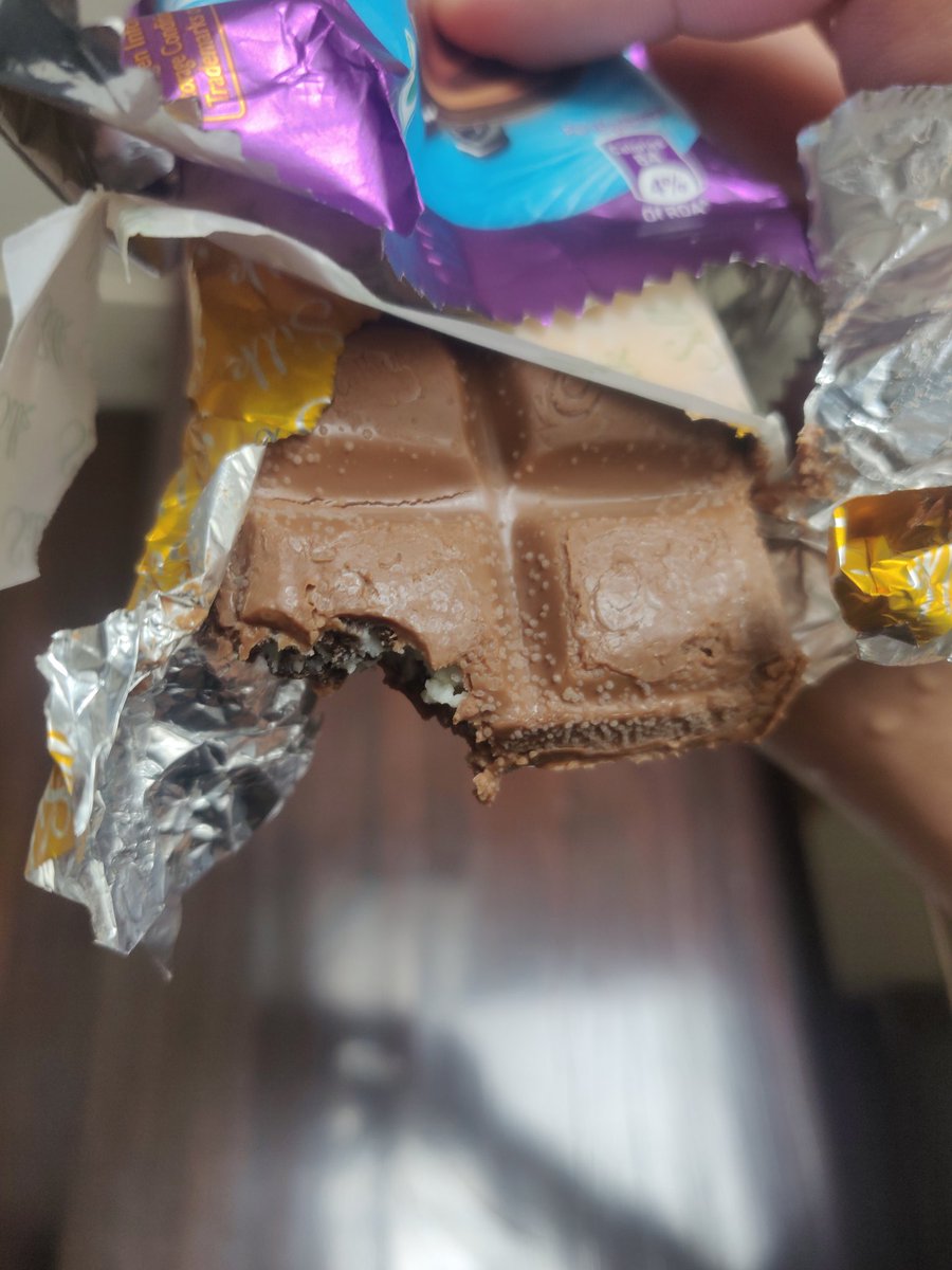 Abhay5599's tweet photo. @DairyMilkIn @cadburysilk @CadburyUK @CadburyWorld @Cadbury_SA @CadburyUK this is spoilt way before expiry date. Absolutely disgusting smell l. Had abite of it and it tasted awful https://t.co/mQfVoeOxFW
