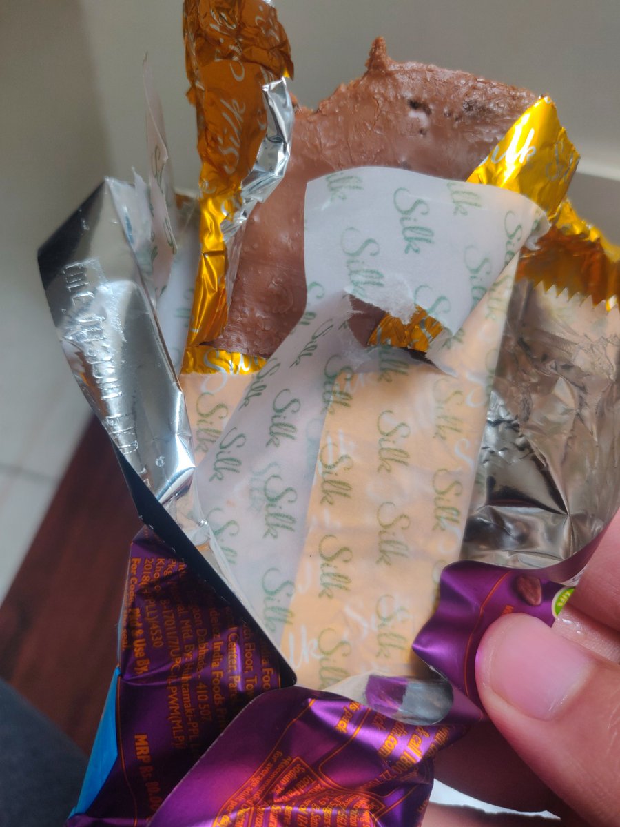 Abhay5599's tweet photo. @DairyMilkIn @cadburysilk @CadburyUK @CadburyWorld @Cadbury_SA @CadburyUK this is spoilt way before expiry date. Absolutely disgusting smell l. Had abite of it and it tasted awful https://t.co/mQfVoeOxFW