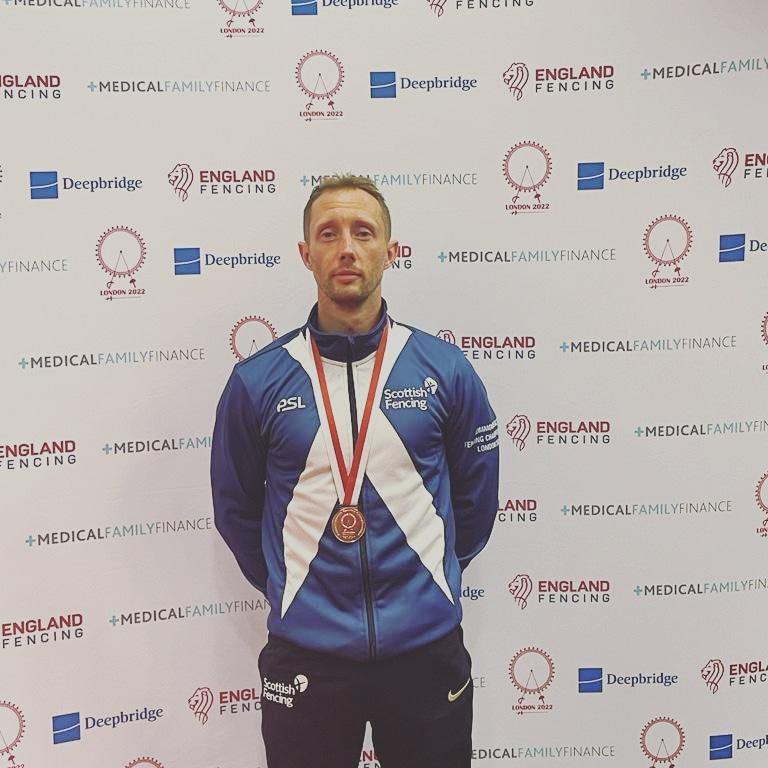 Jo_Walton's tweet photo. What a first week for the family @Fencing2022 Commonwealth Fencing Championships. @keithcook81 takes bronze in the Senior Men's Foil, @JaimiecookF joins him for the teams to take silver and then Jaimie becomes Junior Commonwealth Champion! @curriechs @HTCCHS @BBCSportScot https://t.co/jLAR4eoZtf