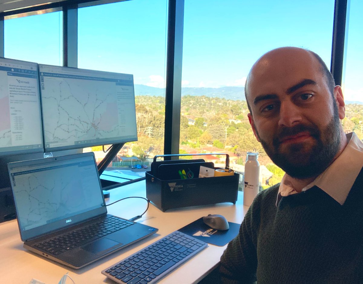 mayermelhem5's tweet photo. Change of workspace. Change of role. Back in the @VicGovDoT office, in a brand new building with sweeping views of the Dandenongs and the tops of #Melbourne city buildings afar. I’ve got my caddy and ready to help look after the state’s #bridges. https://t.co/J2mB2gS5BD