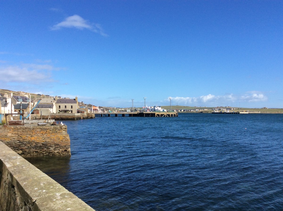 Orkneytim's tweet photo. @JezCox @BriSmithy Orkney certainly is a beautiful pace Jez. This is the view from our pier across Stromness Harbour. As part of a group of Islands Orkney is a great place to explore on the bike using the interconnected ferry services. Sometimes the wind (and the rain!) can be a little challenging! https://t.co/NPoMOYFkd8