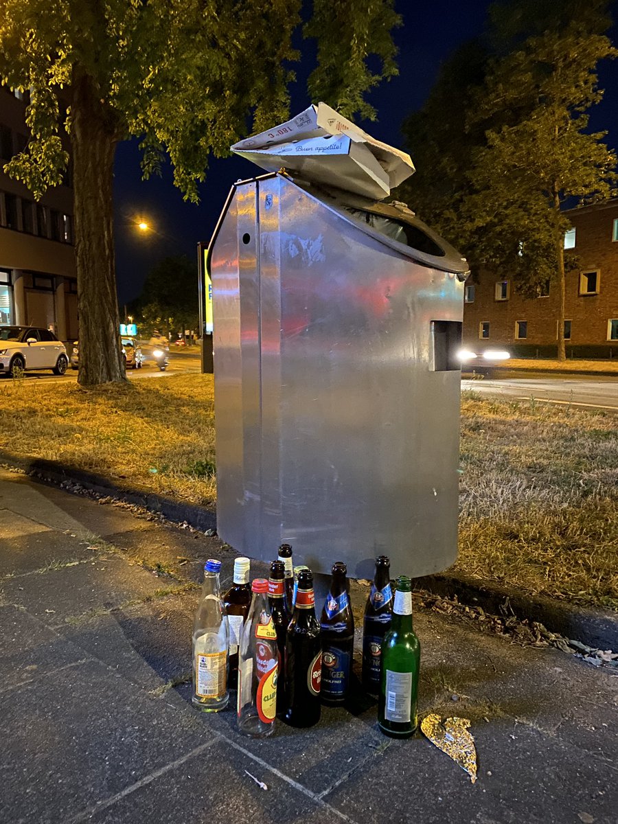 Who knows why rubbish bins have bottles outside them in Germany? #travel #europe #community