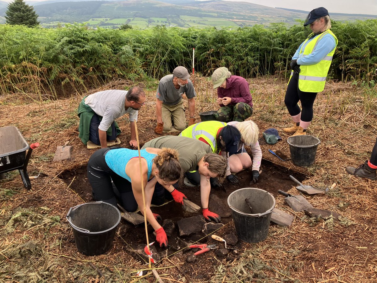 urbanprehisto's tweet photo. Trench 2 being opened up in the interior of #Drumadoon2022 cursus under the watchful eye of @aurime_bockute  - two worked flints found already including an abandoned arrowhead. @ArchScot @UofGArchaeo https://t.co/9dby5jgu74