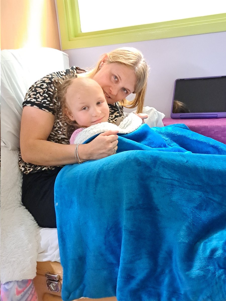 sadlerjason226's tweet photo. My two beautiful girls wrapped up in there blanket #air conditioning in here least we are missing the heat wave 🤣 #teamlottie #warrior #letskeepfighting https://t.co/kq5PrpxrCi