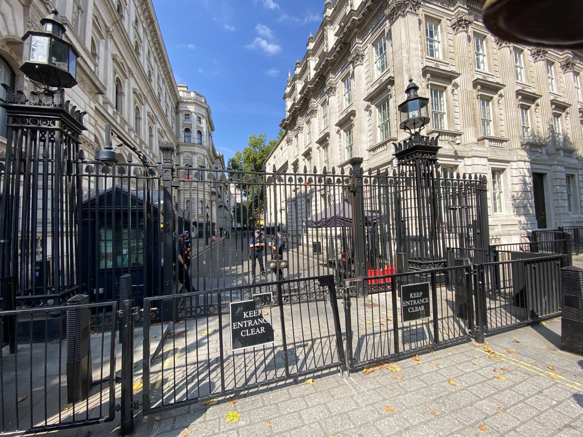 PoliticalPics's tweet photo. The gates of Downing St crashed into by Boris remover’s, reminds me of his premiership car crash from the start to finish. No10 going to great lengths to hide his 4K drinks trolly and his very expensive furnishings!! https://t.co/wADeQFSlaI