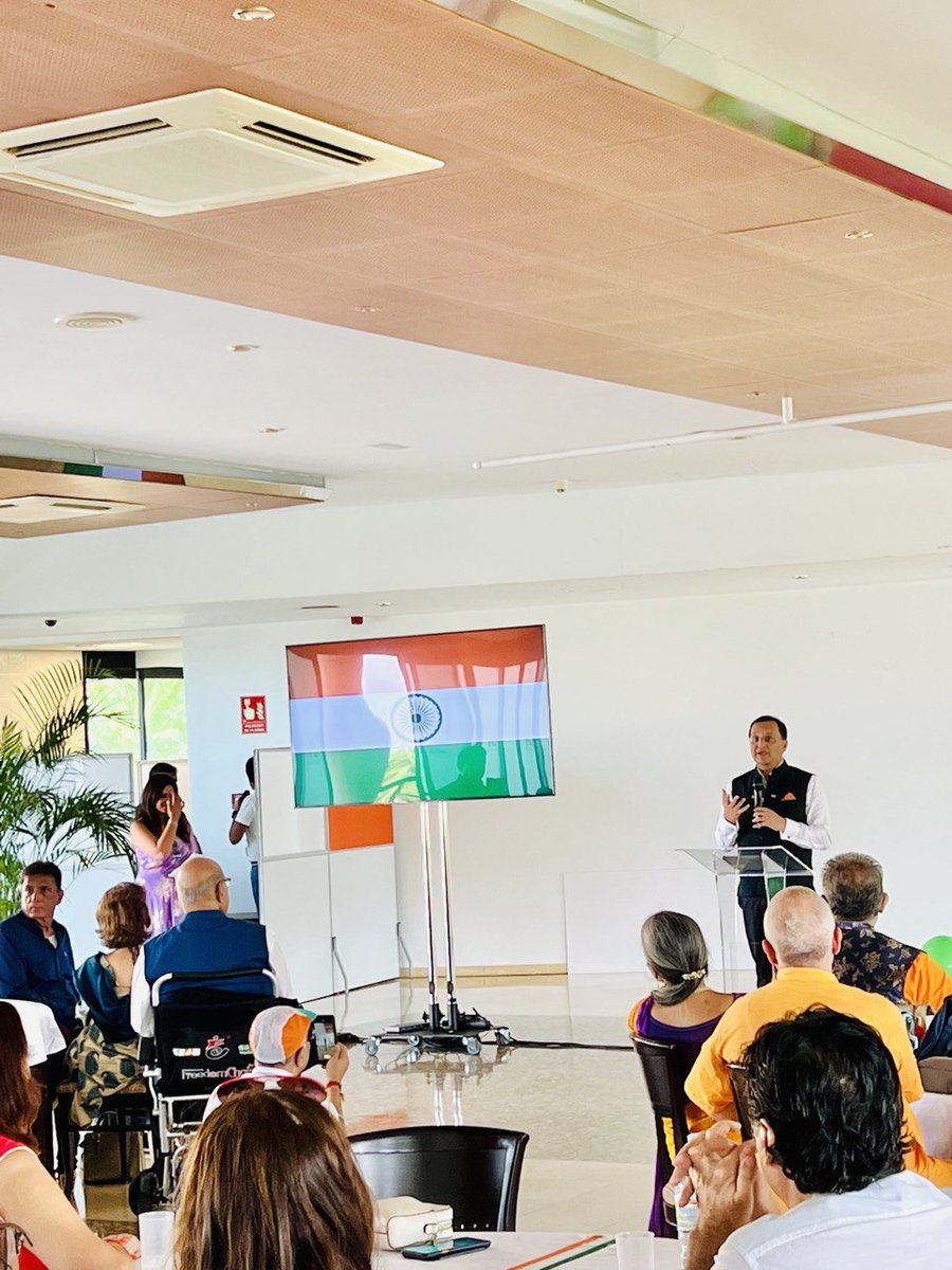 IndiainSpain's tweet photo. Following the flag hoisting, Amb @DineshKPatnaik delivered the President's Address. This was followed by a cultural act, including patriotic songs by children and a dance performance. 
#AmritMahotsav https://t.co/kOKpV3HV4X