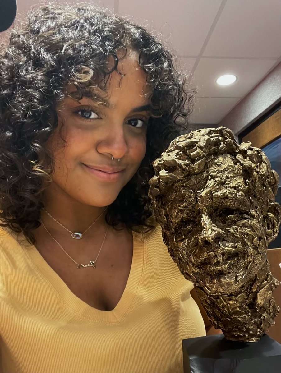 Jaela Burris with her Robert F. Kennedy Award. She won Hillcrest’s tenth RFK for an episode of the “Bay 11” podcast titled, “The Talk.” She will attend Mizzou this fall.