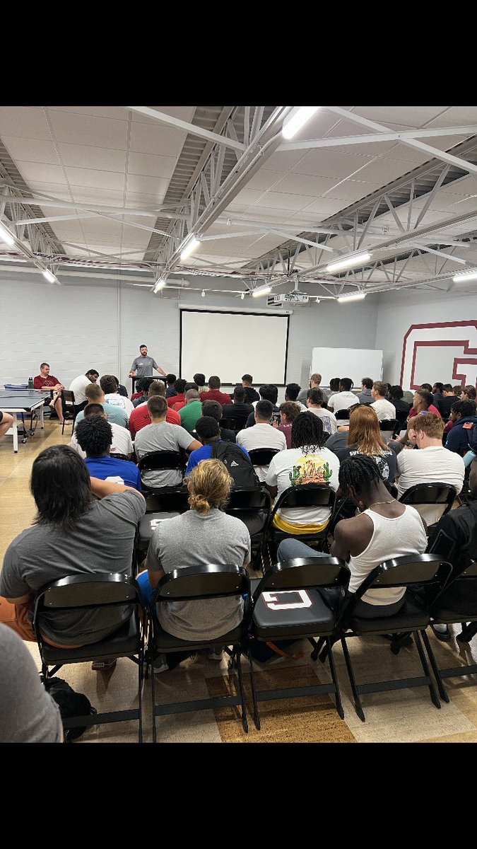 GuilfordFB's tweet photo. Thankful to have 2x All-American and 3x All-Conference WR @AdamSmiff7 on campus to give words of wisdom and inspiration to the team this morning! #CommitToTheG https://t.co/BZYbxgS01k