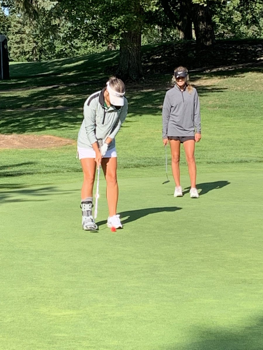 Martha Weight putts on 11 at the NEO coed tournament at Arrowhead