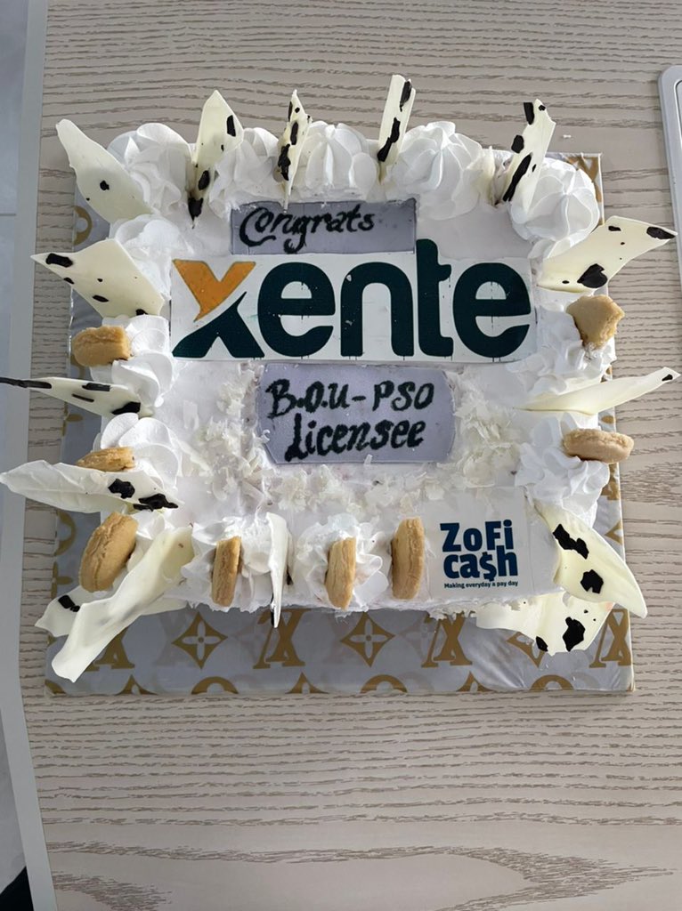 xentetech's tweet photo. Our week started off with a pleasant surprise from our immediate office neighbors @ZofiCash ! 

A whole cake congratulating us upon our recent milestone of acquiring the PSO license from @BOU_Official .

We thank you, Zofi Cash. Revenge coming soon! 🥳🍾 #NewEnergy #NewWeek https://t.co/lYsAjma4Ul