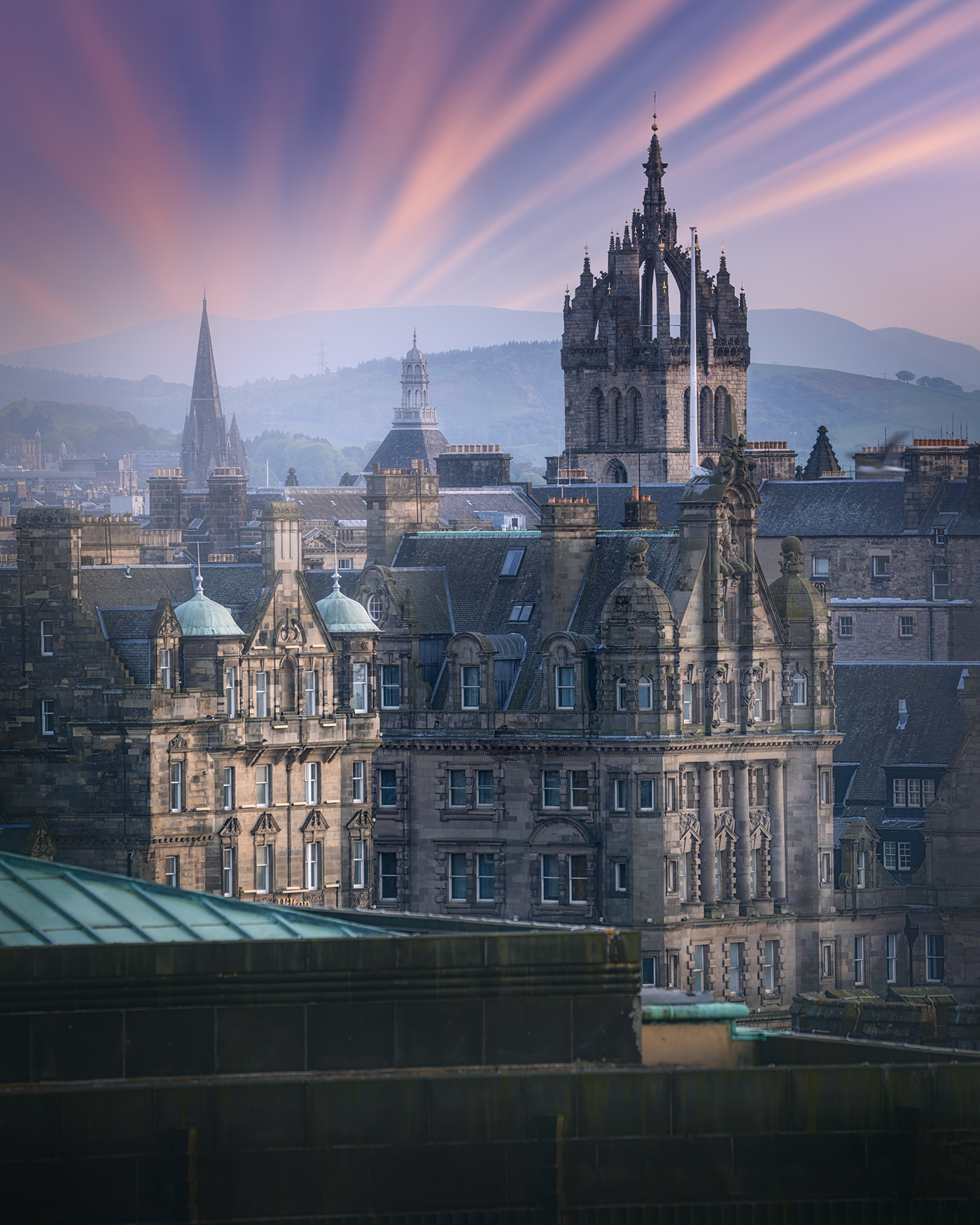 Photo of a castle-like building at sunrise in Scotland