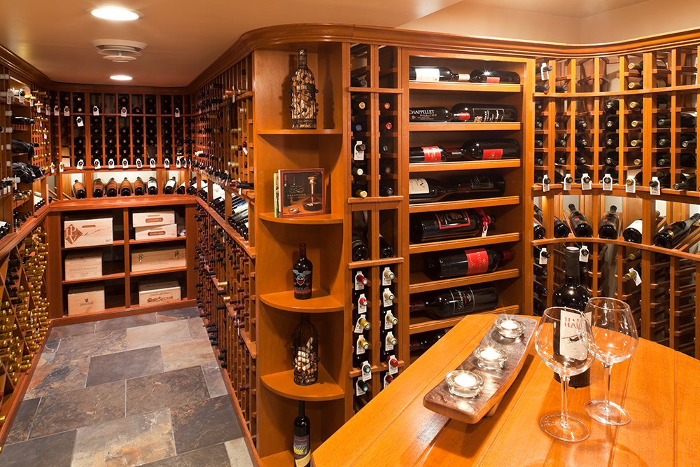 Vigilantinc's tweet photo. It's Monday, and #relaxationday so we're mentally hanging out in this lovely custom #winecellar with our handcrafted #wineracks, the tallest in the industry, that come standard with a stunning display row - what's your 🍷 of choice? https://t.co/0jHjcwSndn