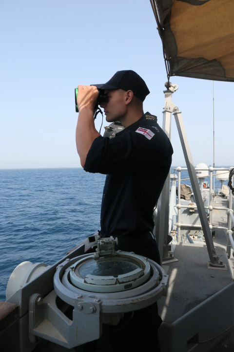 LtGenStickland's tweet photo. Sometimes the Mark 1 eyeball is best. A sailor on board @HMSBangor assisting with her #MaritimeSecurity patrol by identifying vessels in the #MiddleEast @UKMCCMiddleEast https://t.co/QP5Ah4bVdo