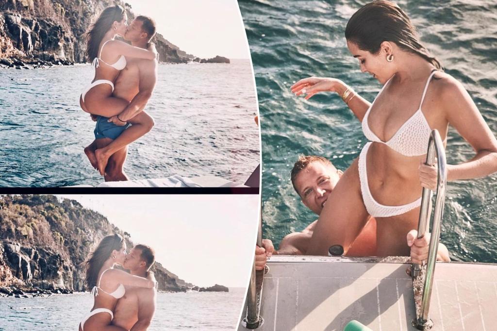 3. Christian McCaffrey bites Olivia Culpo in sultry beach photos. trib.al/4...