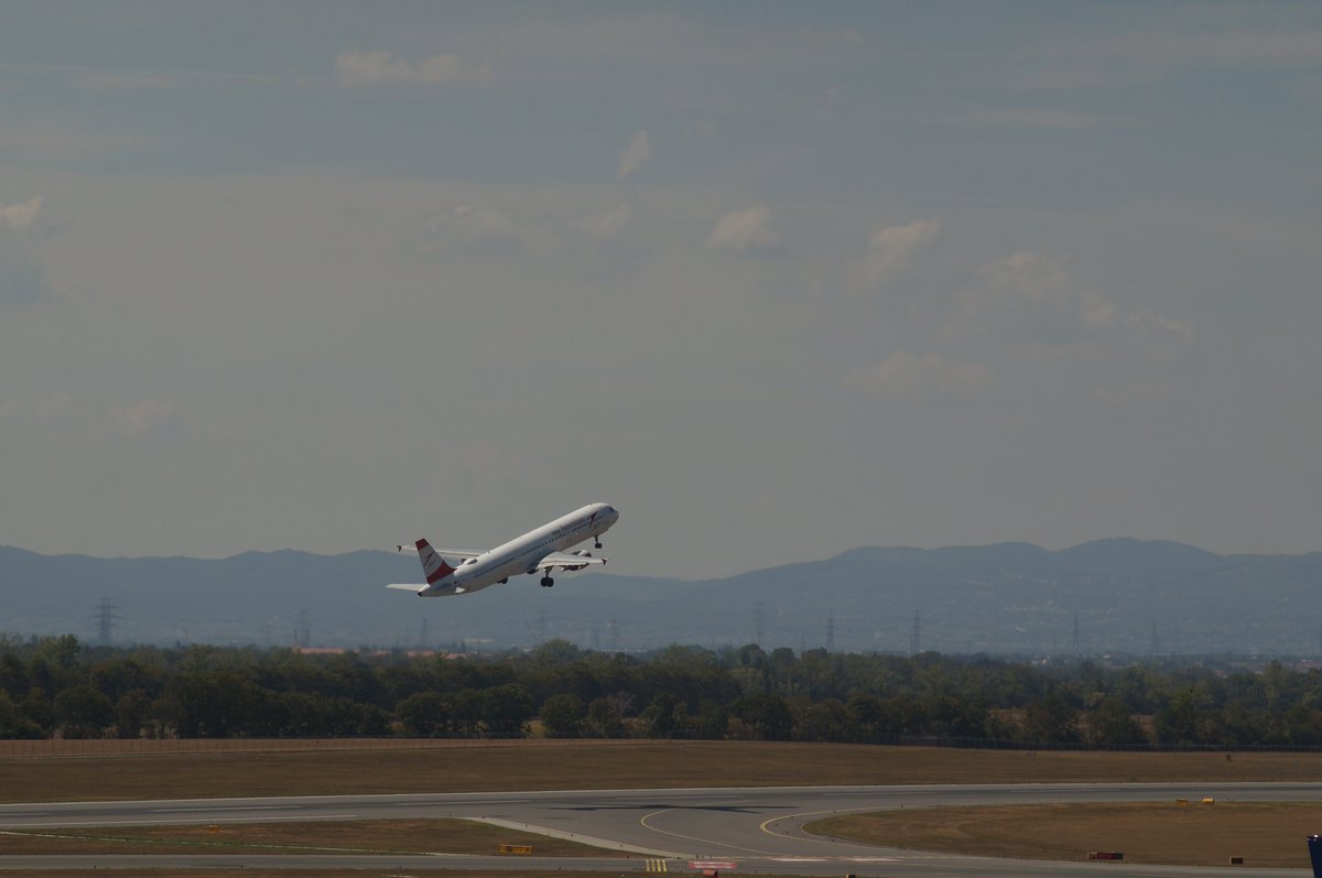 a_kind_of_space's tweet photo. Some #planespotting and a dust devil at the Vienna international airport today. https://t.co/hd5ZCyUhHi