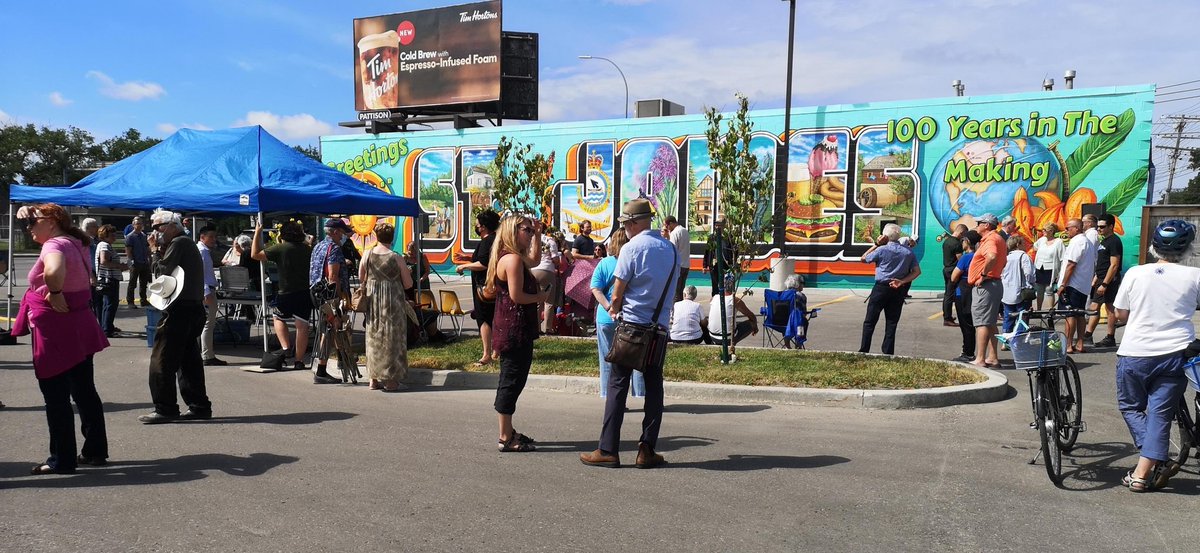 DaevidRamey's tweet photo. I was invited to the unveiling of a mural celebrating St James 100th anniversary. This a great example of collab btwn levels of Gov't, local business's and @assiniboiacc, and brought to life by St James artist, Jen Mosienko. Met a lot of great people too! We need more Public art! https://t.co/z5FoqqWL3S