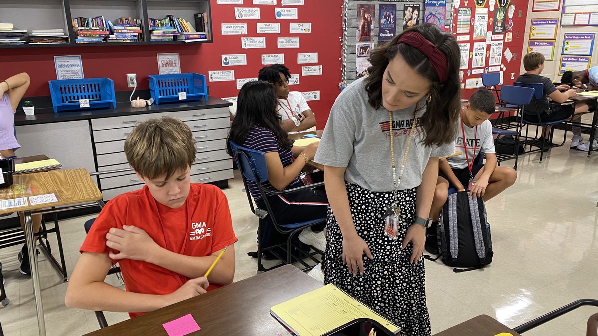 gcschools's tweet photo. Welcome back to school! @GvlleMdAcademy English Language Arts teacher Katherine West welcomes her students to the new school year! Katherine was recently named GCS Secondary Emerging Teacher of the Year! #firstdayofschool #GCStoy #gcssupt #buildingabettergraduate https://t.co/uTrzrqvmv4