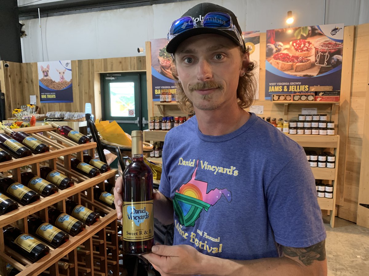 WVDeptofAg's tweet photo. Stop by the #WVCountryStore @SFWV to meet J.T. Lilly and sample wine from Daniel Vineyards. They grow 30 acres of grapes in Crab Orchard to create their wines. They have 8 different varieties, everything from reisling and sauvignon blac to fruit-based wines. Cheers! https://t.co/lySPH0U4i4