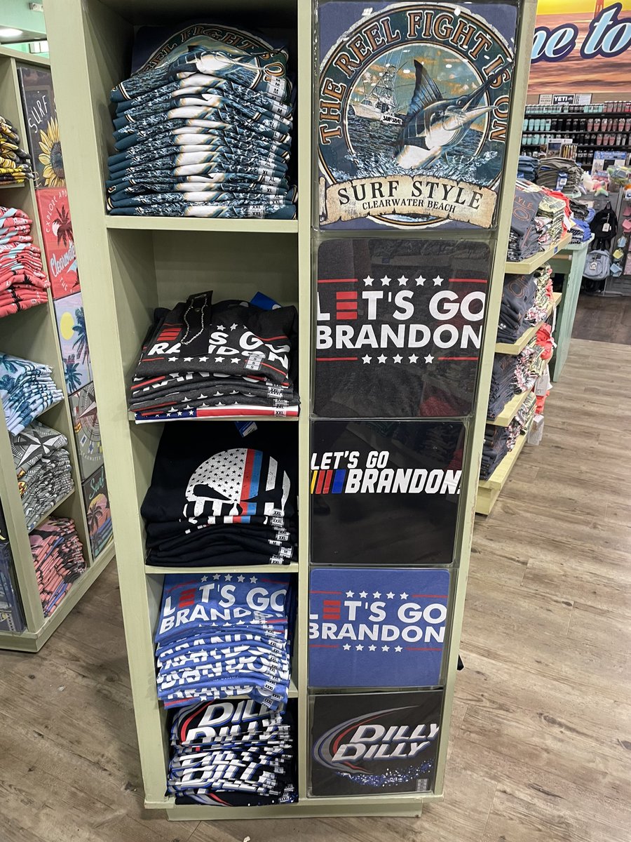 Nathan_Krieg's tweet photo. @SurfStyleBeach really disappointed to see these Let’s Go Brandon shirts in your Clearwater store. Corporations should promote unity and peace, not  messages of vulgarity. https://t.co/flwxvcvOOu