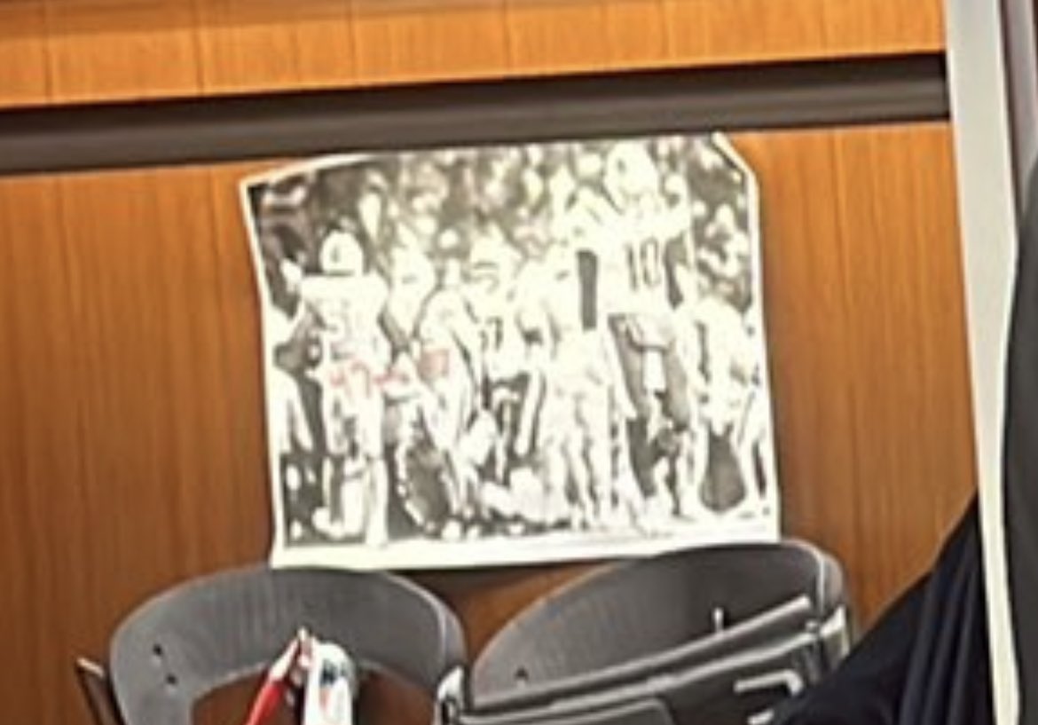 SInow's tweet photo. Mac Jones appears to have a photo of himself hanging his head after the Patriots-Bills playoff game in his locker.

The final score (47-17) is written on it. 

All the motivation 🔥 https://t.co/HpP0gbi2Uj