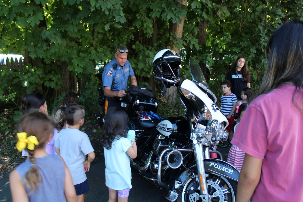 RidgewoodYMCA's tweet photo. A huge thank you to the Paramus and Paterson Police Departments for visiting our campers! The kids loved seeing the motorcycle and K-9 demonstrations! https://t.co/3SL89HBhEn