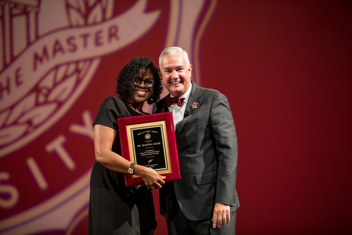 wku's tweet photo. Congratulations to Dr. Martha Sales, the 2022 recipient of the Spirit of WKU Award! 

Read more about Dr. Sales at https://t.co/K0h4IGTUkS or 🧵⤵️ 

#WKU #TogetherWeClimb #WKUConvocation #SpiritOfWKU @WKUISEC https://t.co/9LsA38rEra