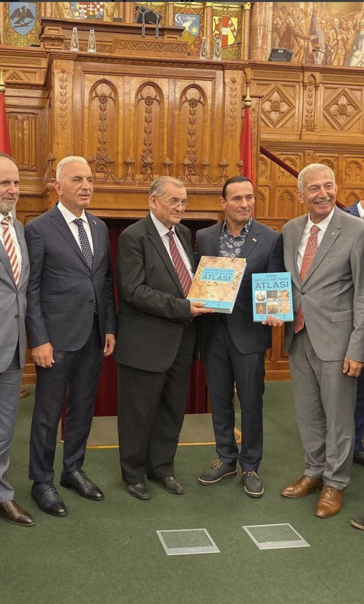 asamresmi's tweet photo. Türk-Hun Kurultayı’nın Macar Parlamento binasında yapılan açılışında Turan Vakfı’nın onursal başkanına Türk Kültürüne Hizmet Vakfı’nın yayınladığı  “Türk Devletleri Tarih ve Kültür Atlası” hediye edildi. https://t.co/5uIsPK8Wdt