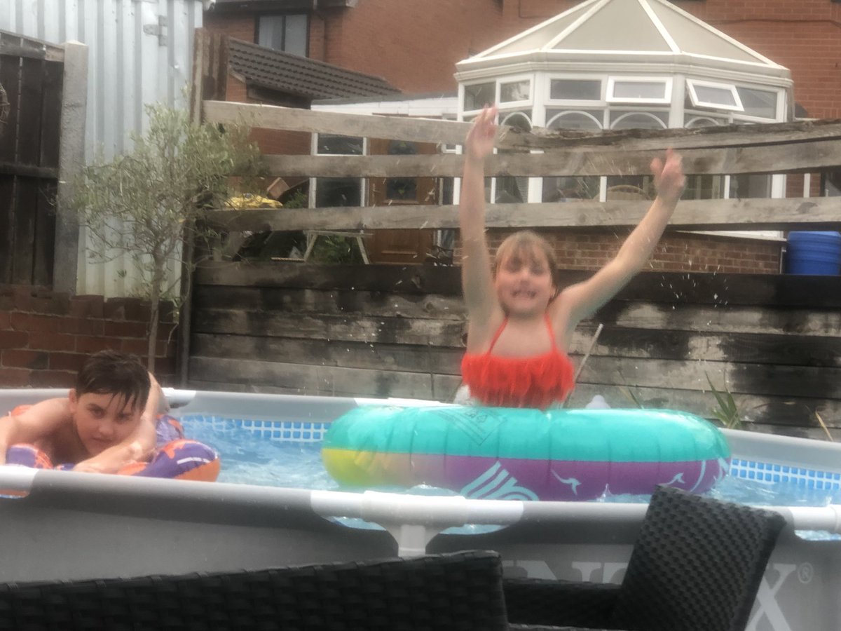 TraceyJAustin's tweet photo. Kids don’t seem to mind the rain and are getting as much time in the pool as possible before the hosepipe ban #funatgrandmas #Grandma #Sleepover https://t.co/rXk5SbMN7y