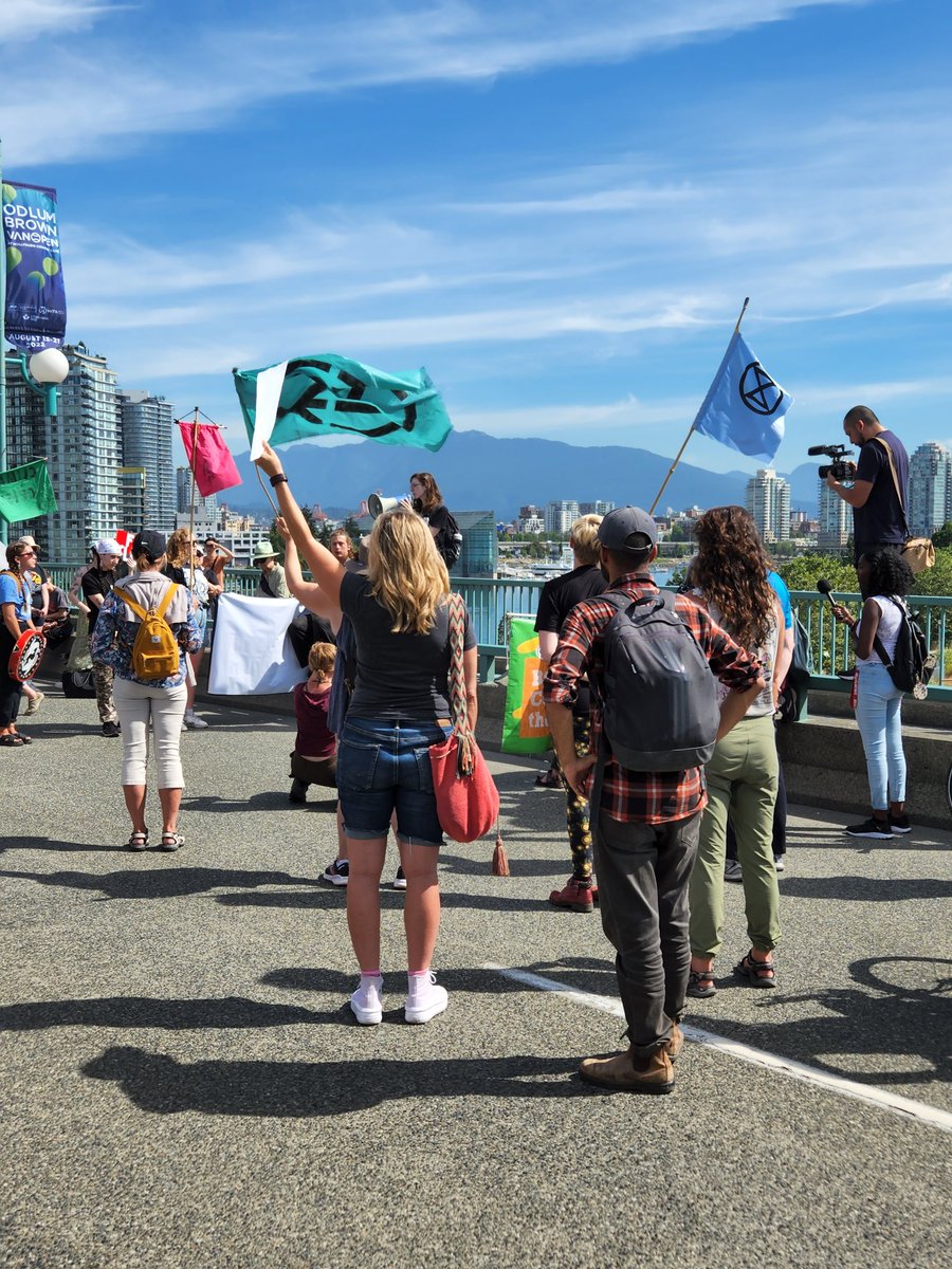 AaronPettman's tweet photo. #wetsuweten anti-fracking march takes Cambie Bridge #VancouverBC. #stopFrackingAround https://t.co/dtnHhFyh3A