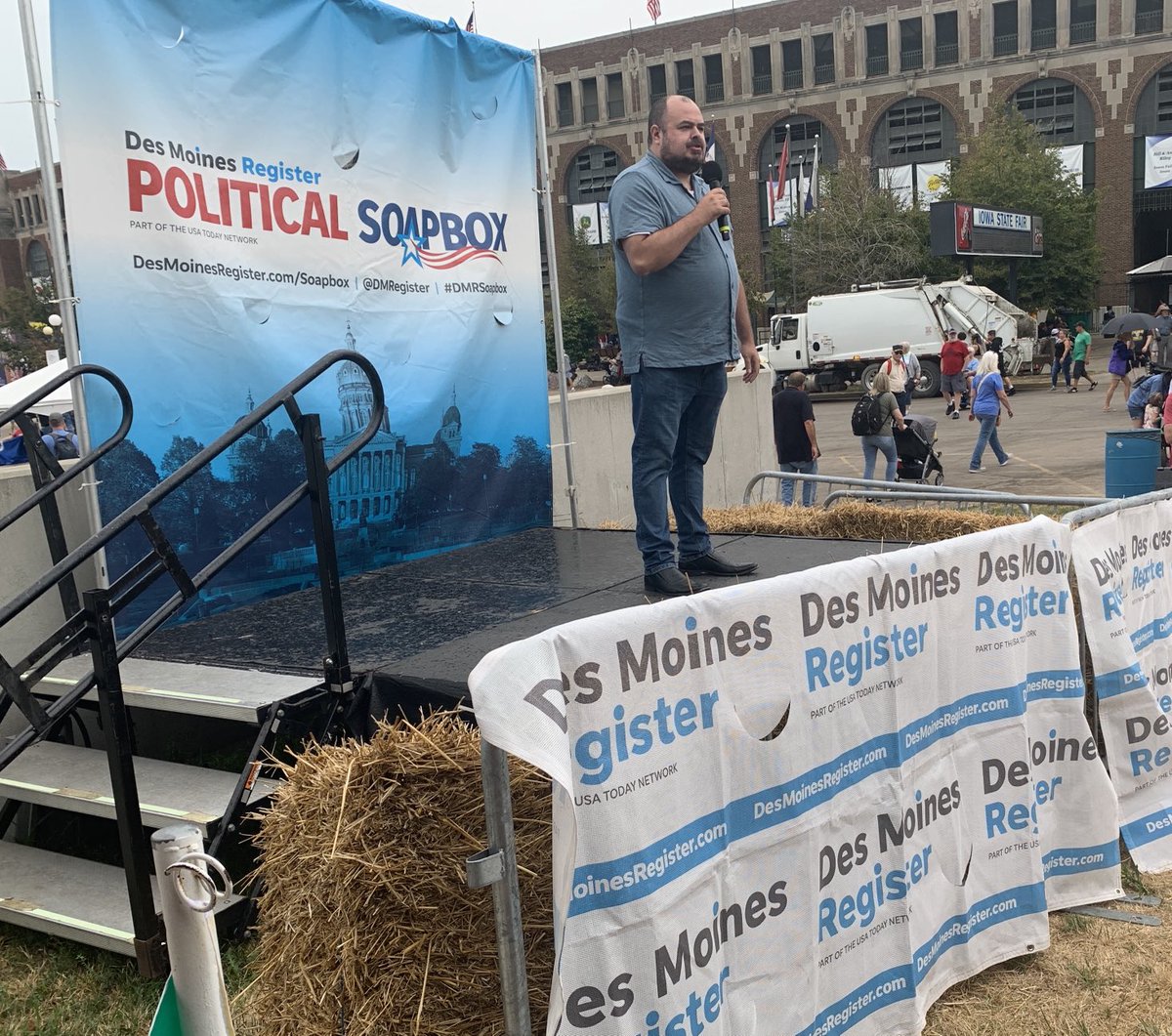 carolhunter's tweet photo. Ryan Melton, ⁦@melton4iowa⁩, is on the ⁦@DMRegister⁩ Soapbox stage. He’s a Democrat from Nevada running for the 4th Congressional District. Opponents: Incumbent Republican ⁦@RandyFeenstra⁩ and Brian Jack Holder of the Liberty Caucus. https://t.co/EUh5XfJ68d