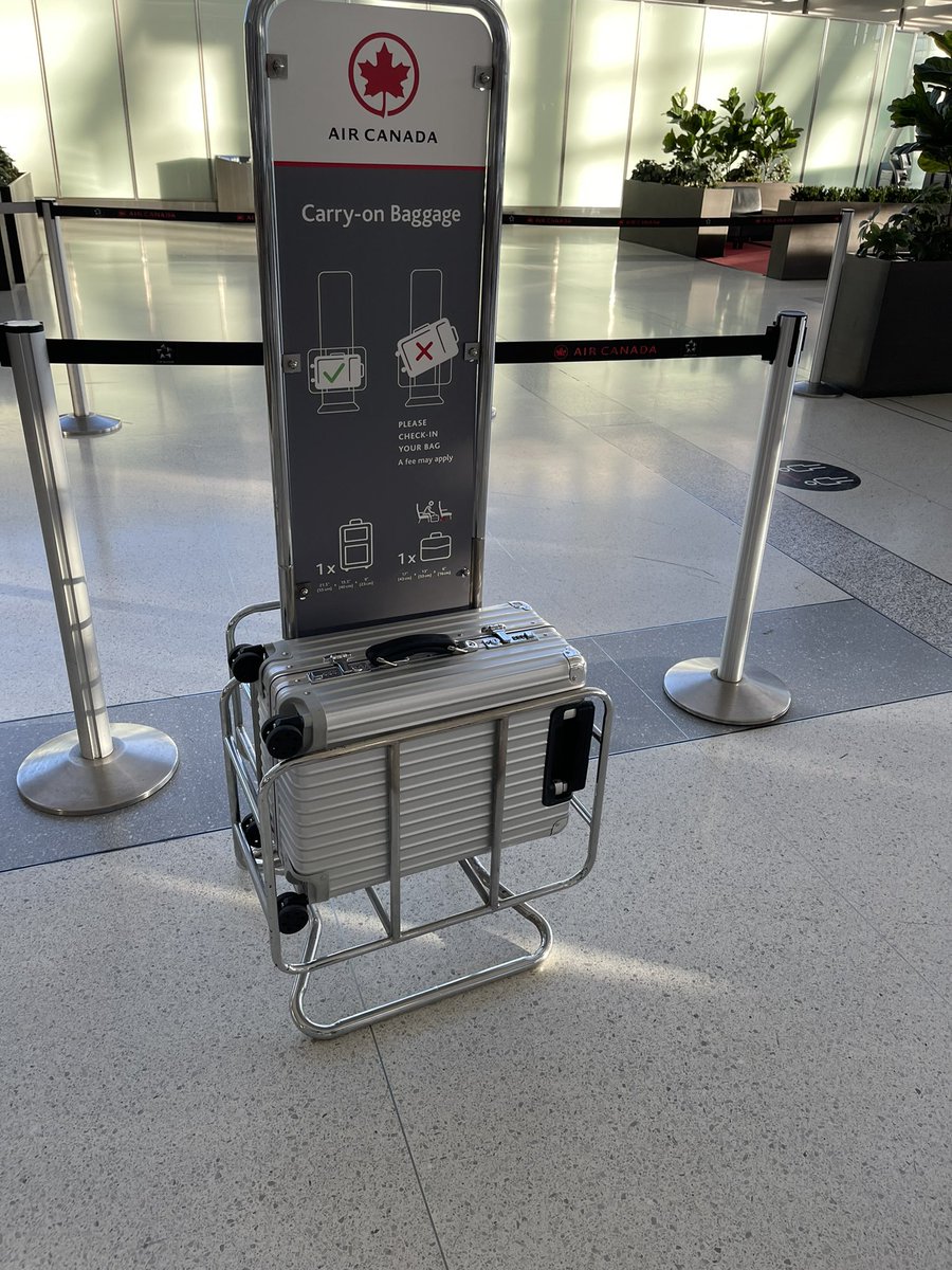 Hey  <a href="/AirCanada/">Air Canada</a> Congrats on finding new ways to alienate customers beyond long lines/late flights. Was verbally abused, followed, suitcase and phone grabbed out of my hand by agent (Pearson biz check in). Reason: carry on was too big. Here is pic of it in bin. Super value add!