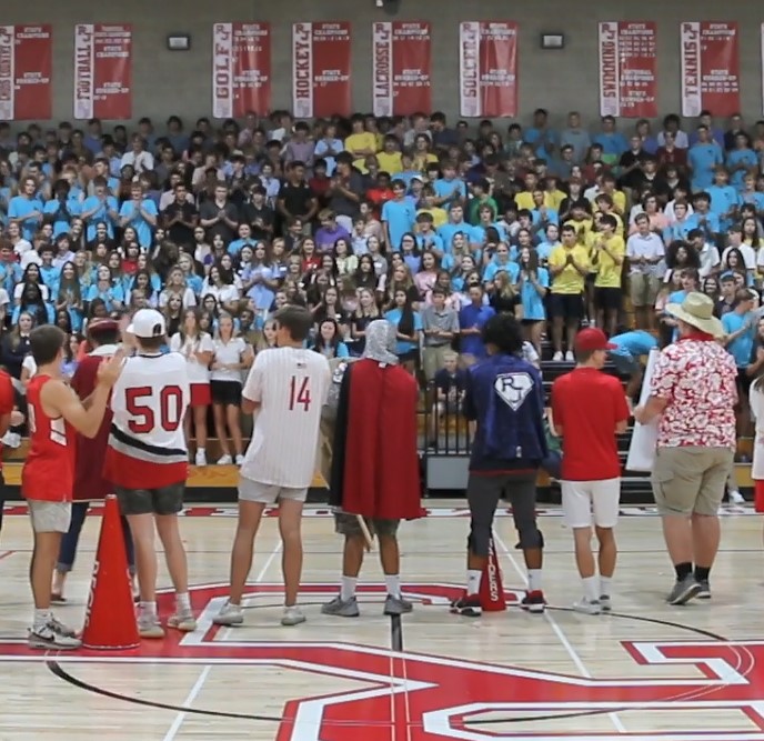 RegisJesuitHS's tweet photo. VIEDO: Supported by VIA leaders and grounds crew, the #Classof2026 quickly got on board with learning some ways to show their school spirit from this year's Rowdies and Cheer squad during Compass Day. WATCH: https://t.co/G6UucqYtJl #RJTraditions #RowdyUp https://t.co/YMXDG8A6L1