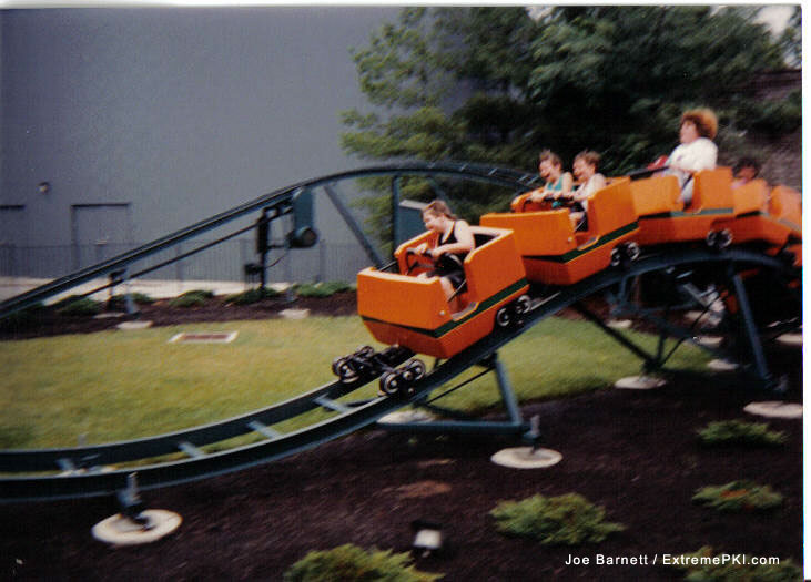 KIHistory's tweet photo. This miniature roller coaster, today known as Great Pumpkin Coaster, has been thrilling some of Kings Island's smallest riders since it opened in 1992. The ride stands a modest 8 feet tall and is 199 feet long. (📸: Joe Barnett / KIExtreme, 1993) https://t.co/fwyH13XgY3