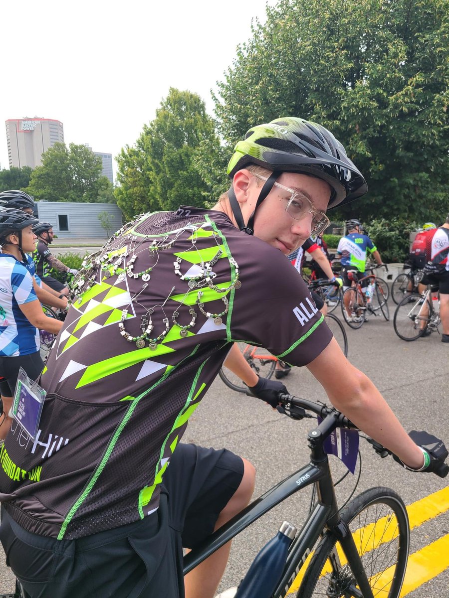 SCpeloton's tweet photo. Alex Amet, first year rider and one of the youngest on Simply Community, created pins for every donation to honor or create a memory of someone. Alex rode 57 miles during Pelotonia ride weekend, proudly, displaying these pins on his back. 

#OneGoal #SimplyCommunity https://t.co/rcMK9DELpr