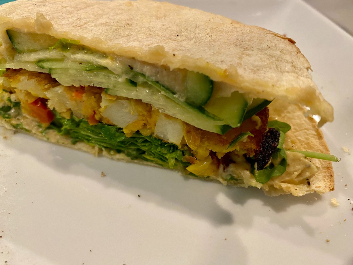 OptamizApp's tweet photo. Sometimes it's all about what you have in the refrigerator. It can be REALLY easy...and insanely delicious! I took a frozen Deep Veggie Masala Burger, hummus, arugula, cucumber, and corn tortillas. Throw some salt &amp; pepper on it...and boom! #easy #plantbased #optamiz #vegan https://t.co/q8fKCht9VN
