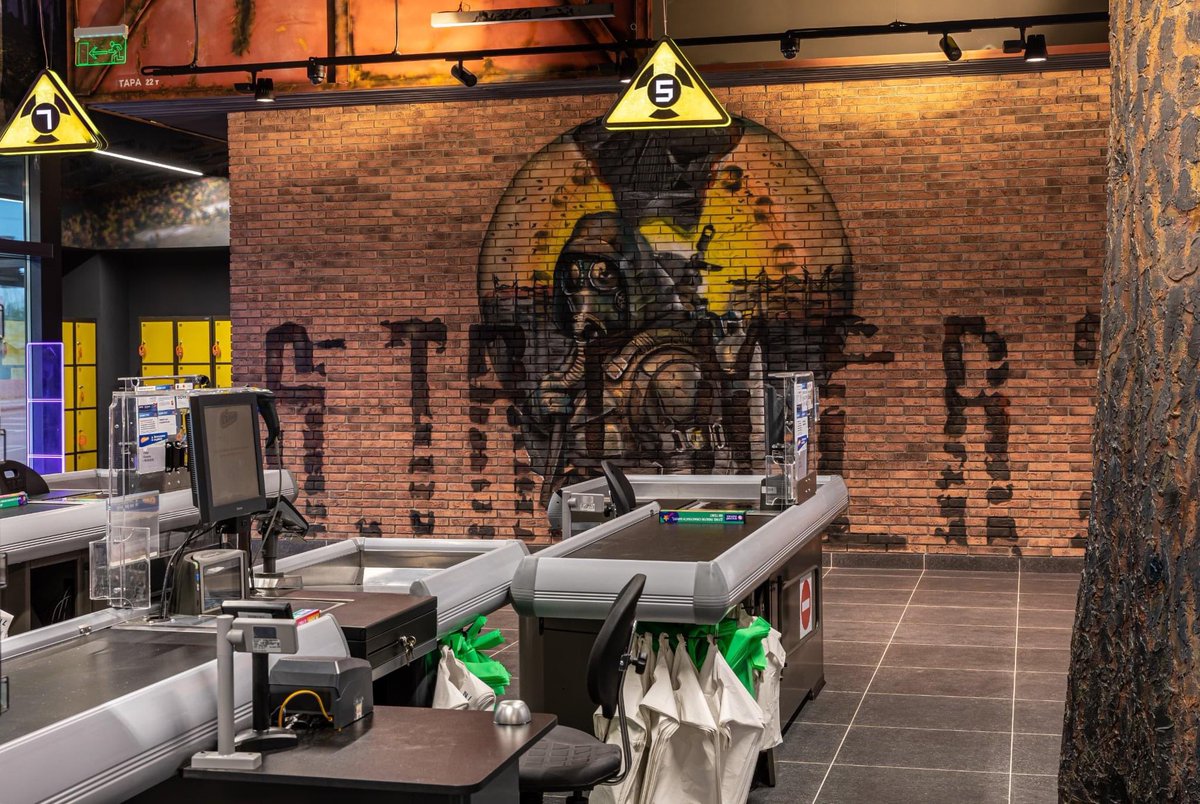 daryna_antoniuk's tweet photo. Russia: launches missiles over Ukraine’s nuclear power plants.

Ukraine: opens a S.T.A.L.K.E.R.-themed supermarket. 

Love it! Thanks @GSC_GW, @silpo_ua https://t.co/na6tB50r0t