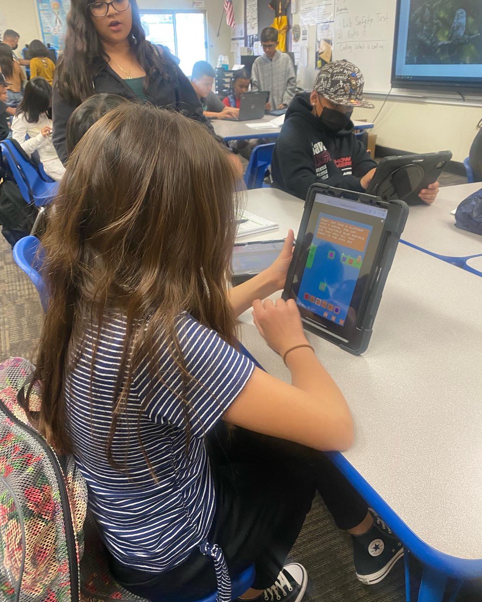 NicoletMiddle's tweet photo. Our 6th graders are loving their coding class with Mr. Lopez! Programming Sphero robots and games… who wouldn’t?! 💚🐎#palominopride https://t.co/LWZky7VsiO