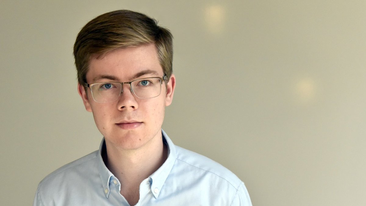 Portrait photo of person staring directly into the camera.