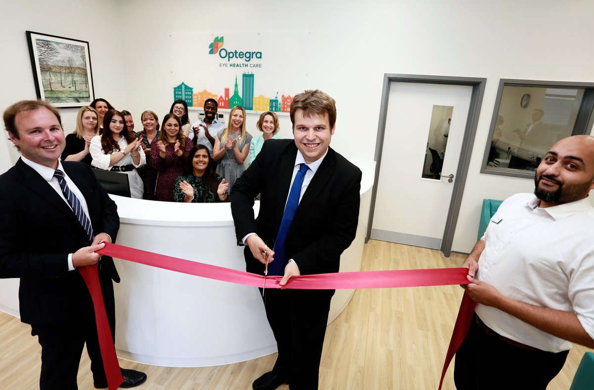 Optegra's tweet photo. Thank you Cllr Matt Boughton, Leader of the Council, who officially cut the ribbon at our launch of Optegra Eye Clinic Maidstone. Here he is with surgeon Robert Petrarca (l), clinic manager Ibrahim Toma (r) and the Optegra team. #TMBC_Kent #MattBoughton93 https://t.co/97DBHupjeL