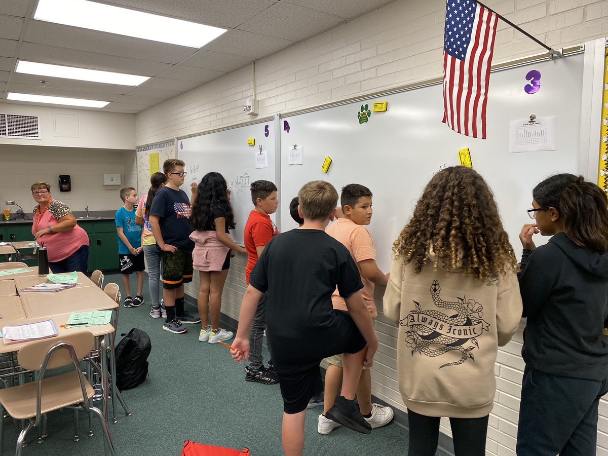 Thinking about math problems and working together. <a href="/SalinaSouthMS/">South Middle School</a> #305growsgreatness