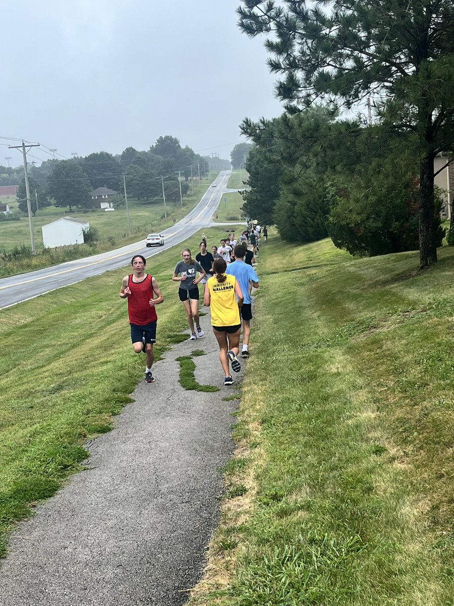 BLXC hitting the hill hard in this rain. Feels like cross country weather! 🌧