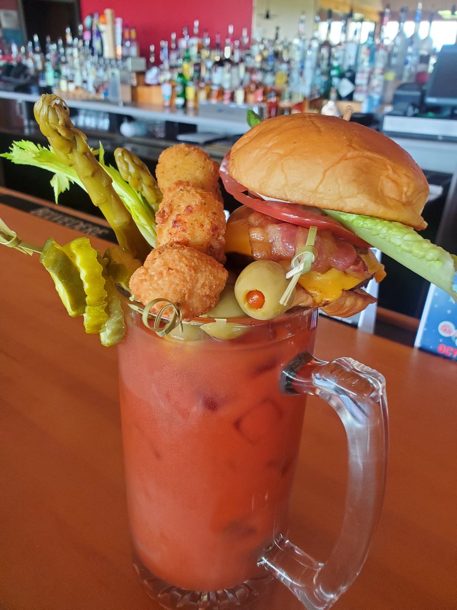 I_Am_Ohlanger's tweet photo. American Waygu bacon slider with roasted garlic aioli, horseradish pickles, pickled asparagus, olives, fried bacon gouda bites, hot pepper balls served over our signature 24oz bloody. The Eldorado Biarritz https://t.co/Of24aW5kg3