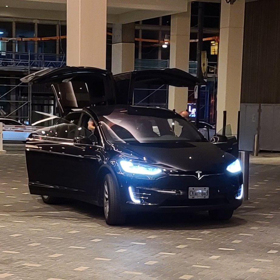 LauraMeetWorld's tweet photo. What is it with me and Teslas at #EhConCanada? If you know, you know. https://t.co/rfJ8Z5Nye7