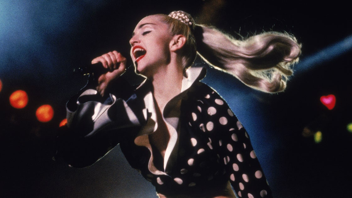 VogueRunway's tweet photo. For Madonna's 64th birthday today, we are taking a look back at some of her most iconic looks from her shocking shades of platinum blond to her unforgettable signature red lip. https://t.co/TH6SAqx2vZ https://t.co/UH5iNtXN9z