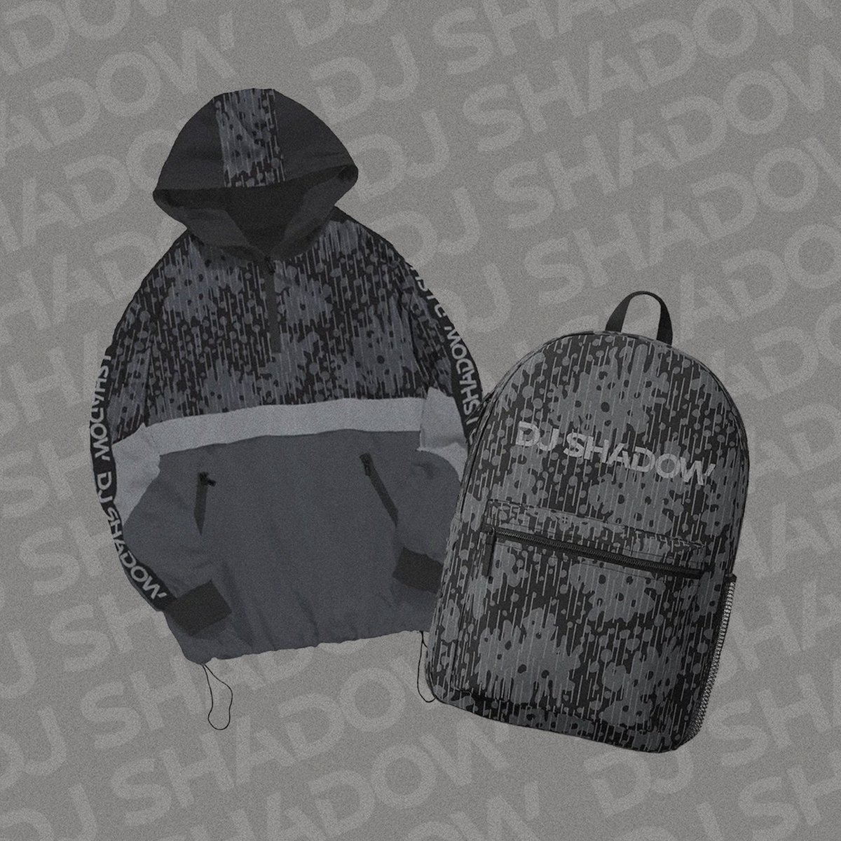 djshadow's tweet photo. This exclusive DJ Shadow Backpack and Windbreaker are now available! Designed as a set, both come in a sleek back and grey print, perfect for the fall season. Shop now at https://t.co/sUN0AA2Wwp. https://t.co/ShpZI4inHL
